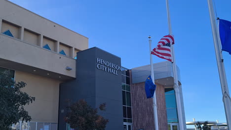 Henderson-NV-USA,-American,-State-and-City-Flag-Waving-in-Front-of-City-Hall-Building