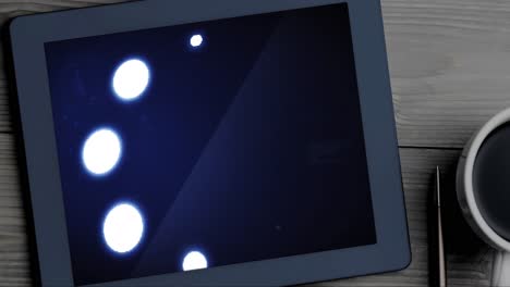 animación de los círculos de procesamiento y carga de datos en la pantalla de la tableta