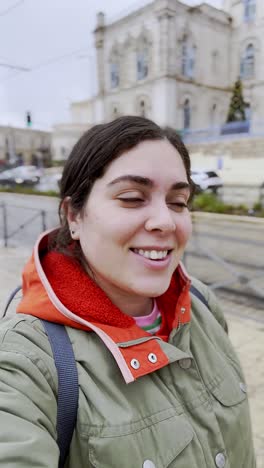 Woman smiling in city street
