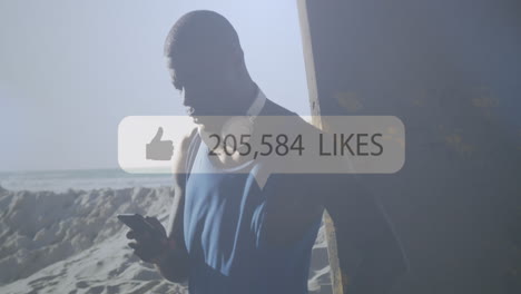 speech bubble with increasing likes against african american fit man using smartphone at the beach