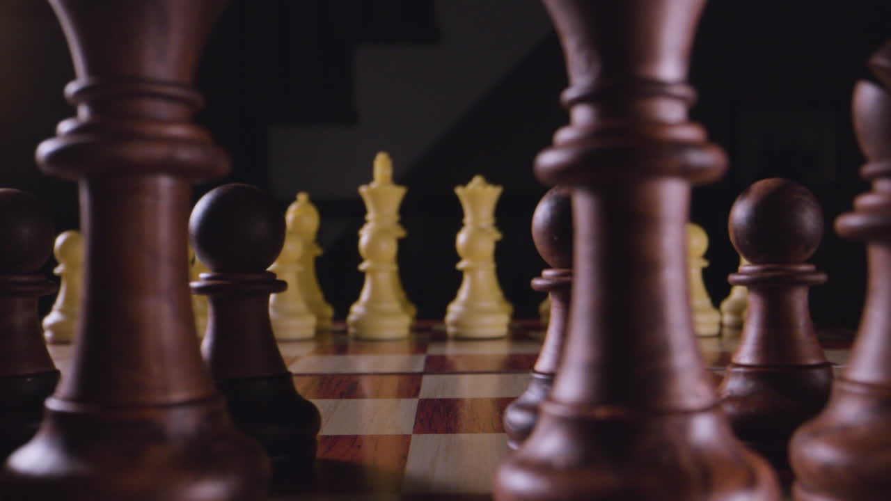 Chess board. Macro dolly through the pieces.