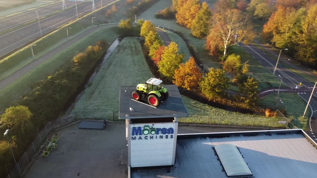 Tractor on top of a building