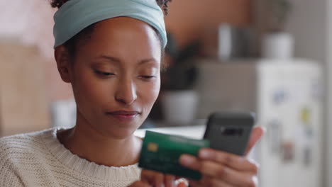 beautiful woman using smartphone shopping online spending money on credit card mobile banking app with digital currency enjoying financial freedom