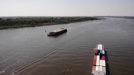 Motor-Freighter-Cargo-Ships-On-Calm-River-On-A-Sunny-Day