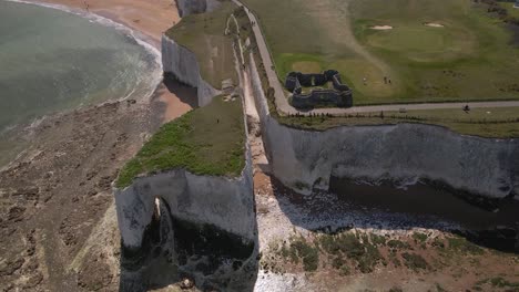 kingsgate bay white chalk cliff coastal formation english kent seaside aerial top down view orbiting left