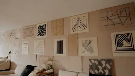 modern living room with abstract art gallery wall and contemporary furniture