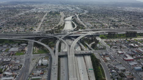 AERIAL:-Spectacular-Judge-Pregerson-Interchange-showing-multiple-Roads,-Bridges,-Highway-with-little-car-traffic-in-Los-Angeles,-California-on-Beautiful-Sunny-Day