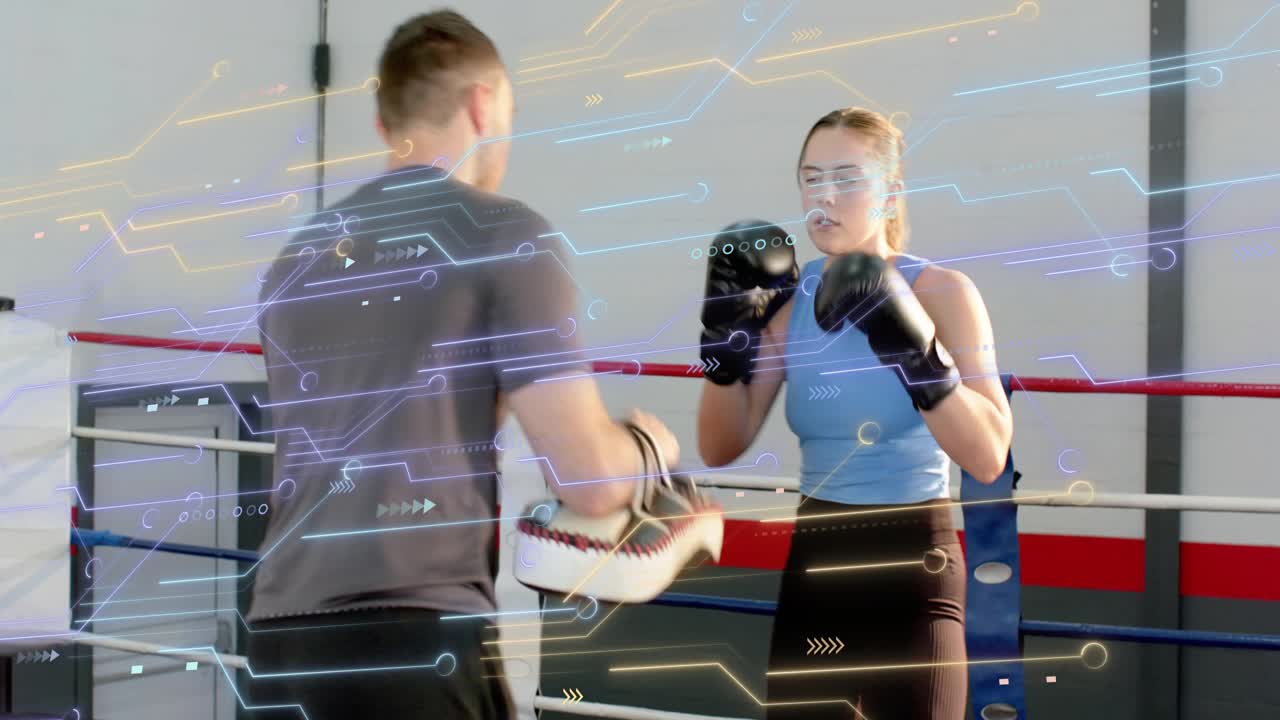 Female boxer reacting to trainer shifting mitts in boxing ring, landing jabs, practicing timing