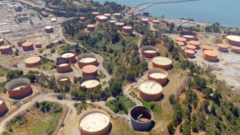 Aerial-view-above-Dutra-materials-raw-construction-manufacturing-factory,-Oakland,-California