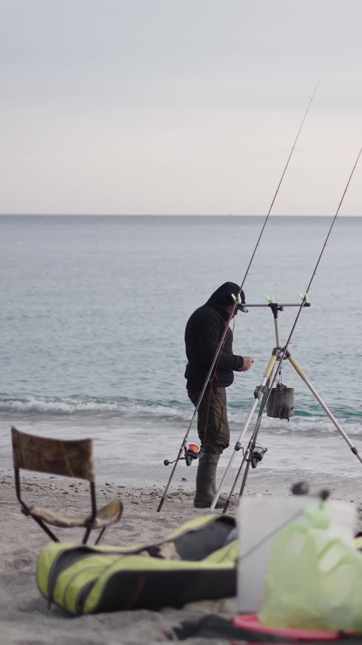 Fisherman enjoying fishing on the beach