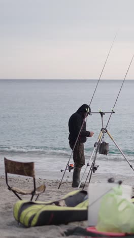 fisherman enjoying fishing on the beach