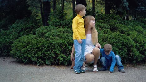 Portrait-of-a-young-mother-with-two-children