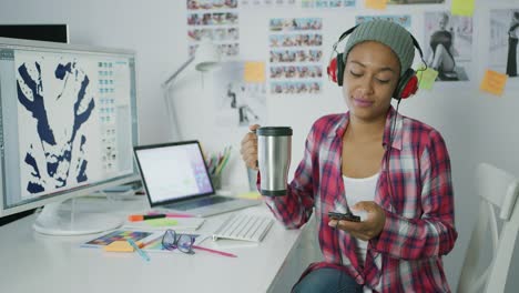 trendy worker relaxing at workplace