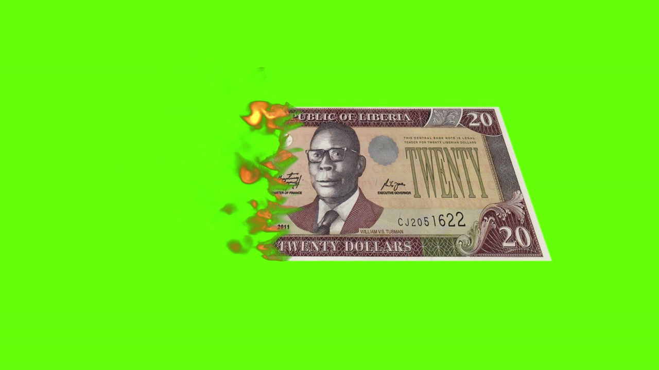 Banconota da 20 dollari liberiani in fiamme su schermo verde