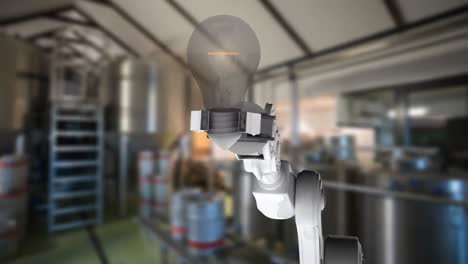 robotic arm catching a light bulb in a warehouse