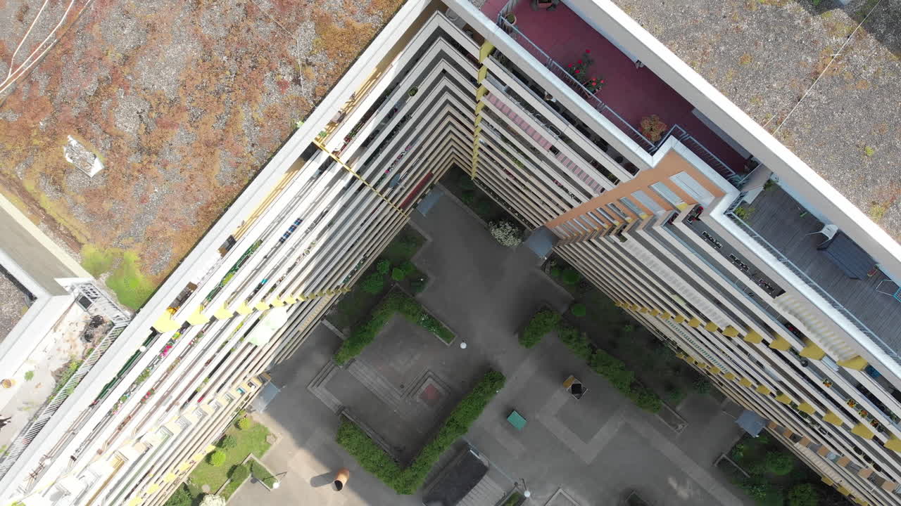 Rising above tall residential apartment building in Germany, Heidelberg