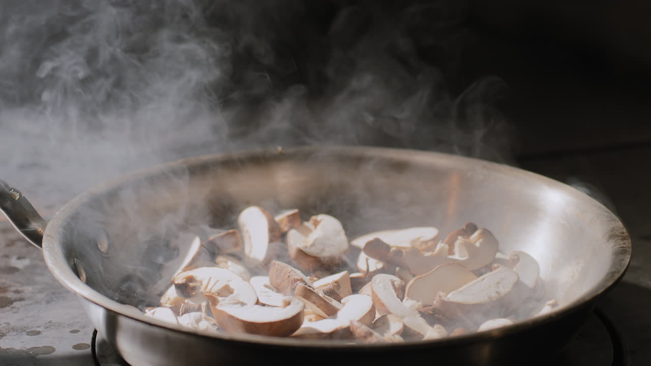 Mushrooms Being Saut&eacute;ed in a Hot Pan