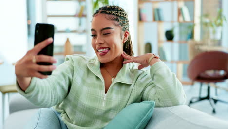 Selfie,-relax-and-woman-with-phone-on-sofa