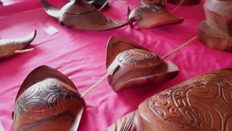 Stingrays-carved-in-wood-with-Polynesian-designs-in-store-on-Bora-Bora