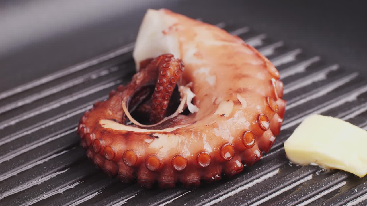 Octopus cooking, chef grill fresh octopus galician style on restaurant kitchen, healthy food, seafood cafe in spain, traditional asian japanese spanish and mediterranean dish.