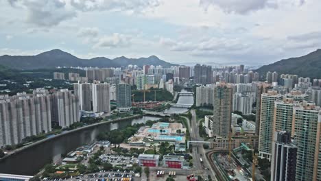 Tuen-Mun-from-Above,-Aerial-View-on-the-River-and-Buildings,-Hong-Kong