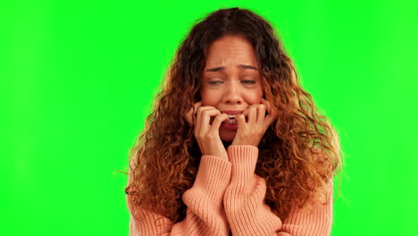 green screen, face and scared woman biting nails