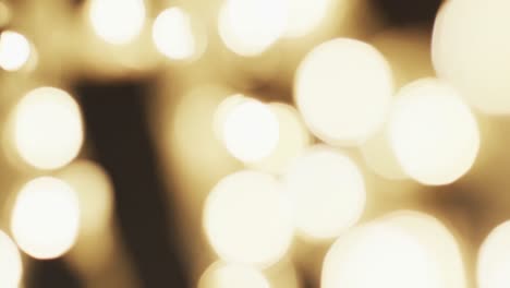 Video-of-flickering-white-bokeh-spots-of-light-with-copy-space