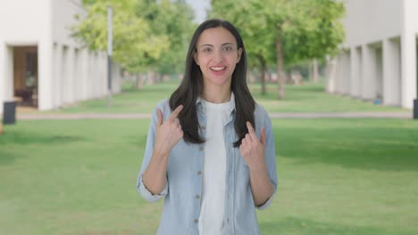 Happy-Indian-girl-talking-to-the-camera