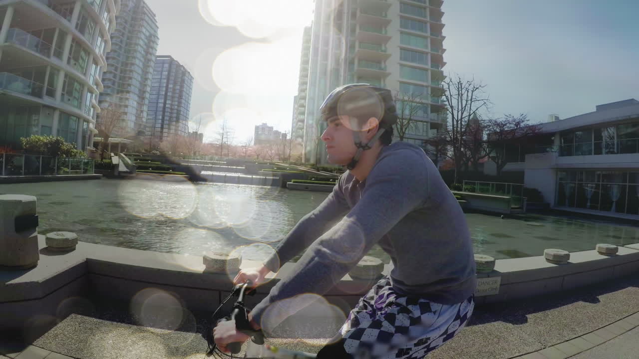 백인 남성 자전거 타기 위에 빛의 반점의 애니메이션