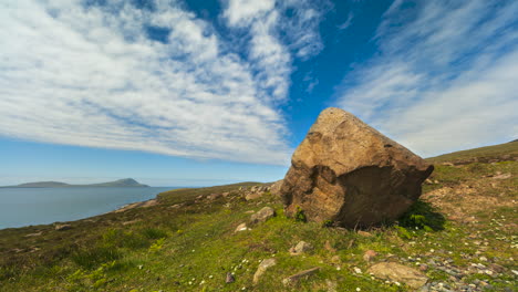 Timelapse-of-coastline-with-moving-clouds-and-boulder-rock-in-Spanish-Armada-Viewpoint-in-county-Mayo-on-the-Wild-Atlantic-Way-in-Ireland