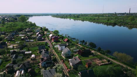 summerhouse district next to daugava river on sunny day in baltic latvia