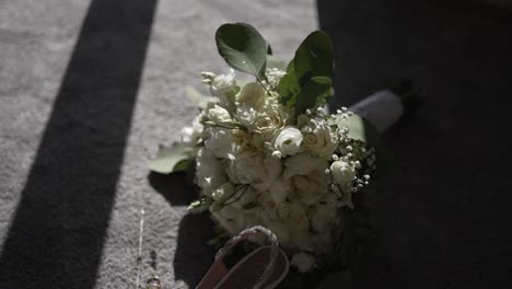 elegant white bridal bouquet and accessories