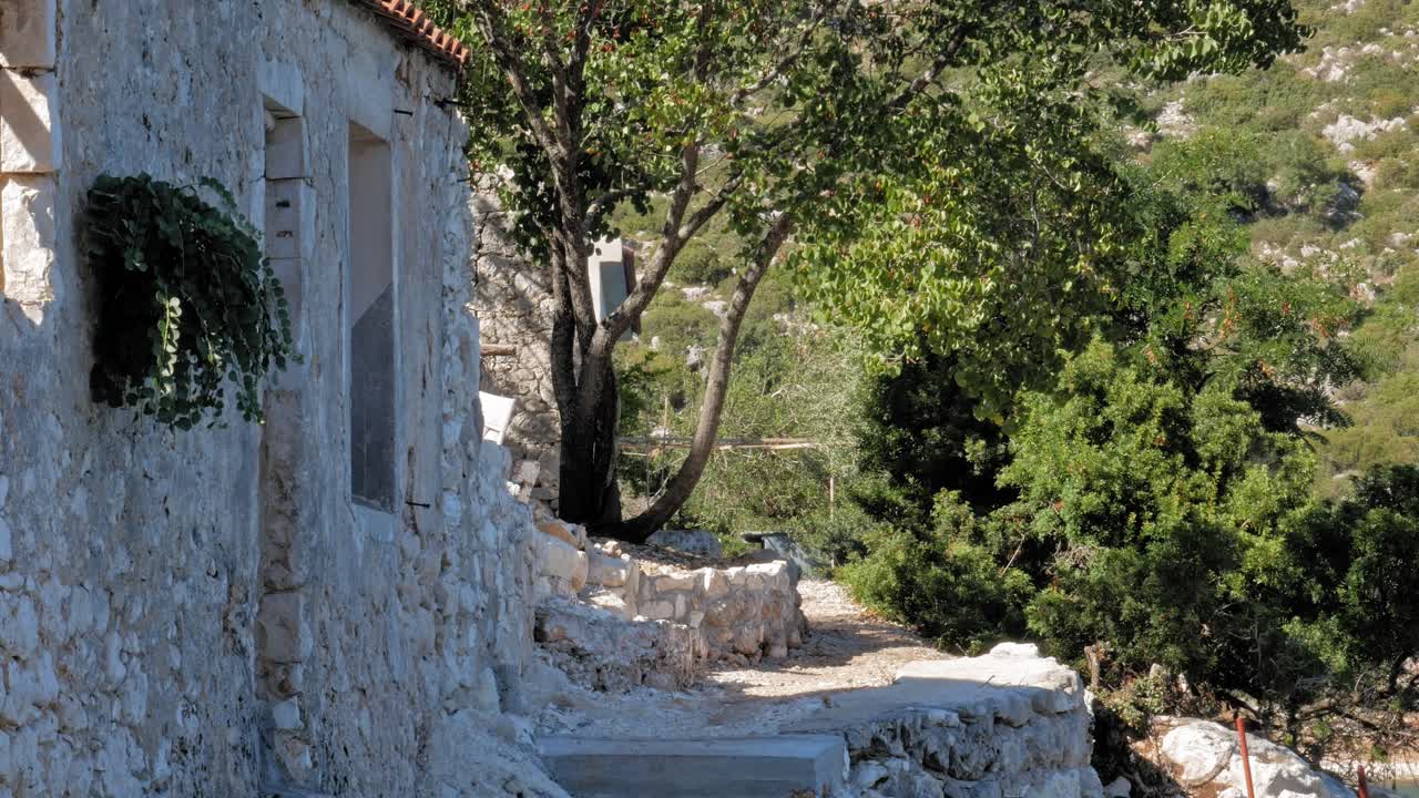 Facade Exterior Of An Ancient Structure In Plati Beach Port In Agia Sofia, Kefalonia Island, Greece