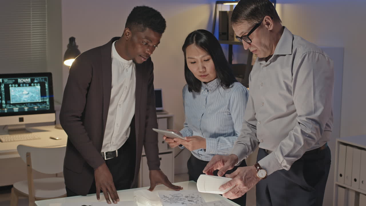 Team of Engineers Working in Office