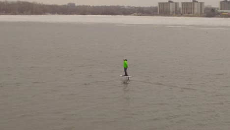 Young Man riding a Hydrofoil board