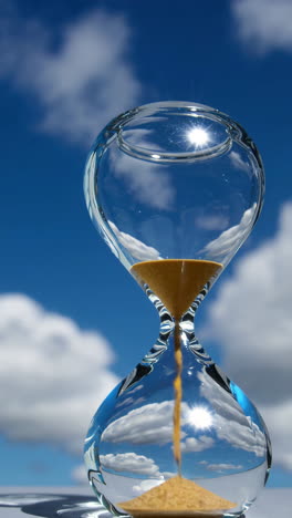 hourglass against a beautiful sky