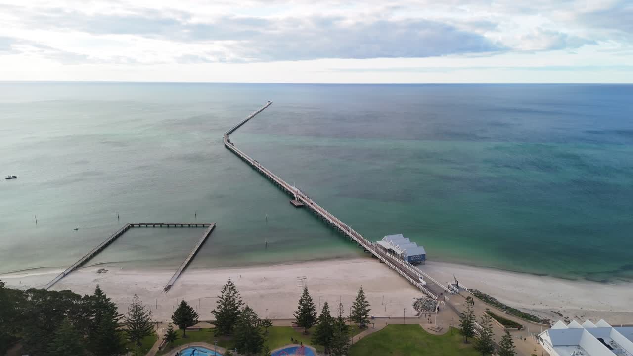 Drone panning around Busselton Jetty with calm seas