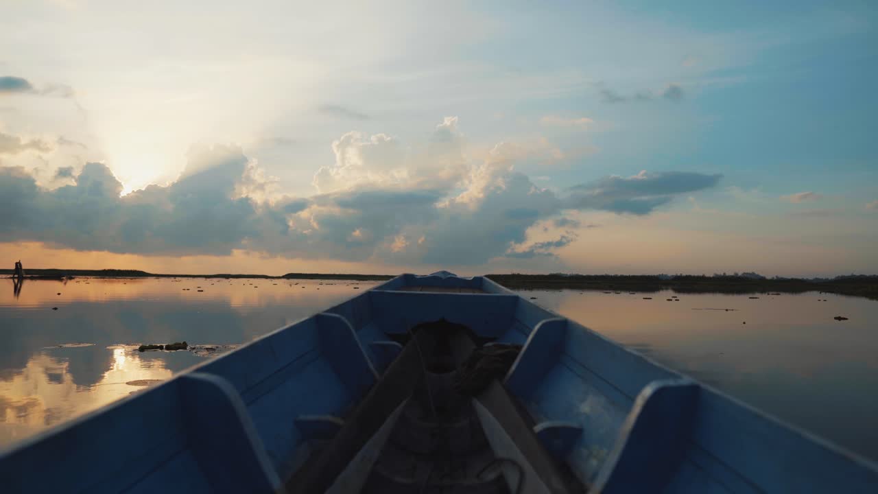 Sunrise/Sunset View from a Boat on a Calm Lake
