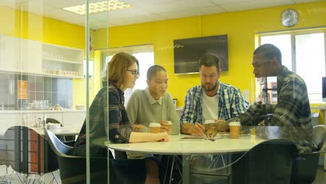 young mixed race business team interacting with each other in modern office 4k