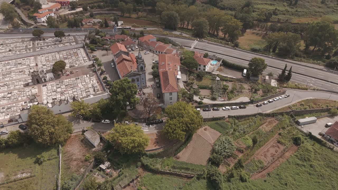Aerial - Campanhã main church, cemetery, and surrounding area in Porto, Portugal