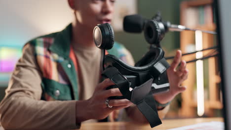 man holding vr headset in studio setting