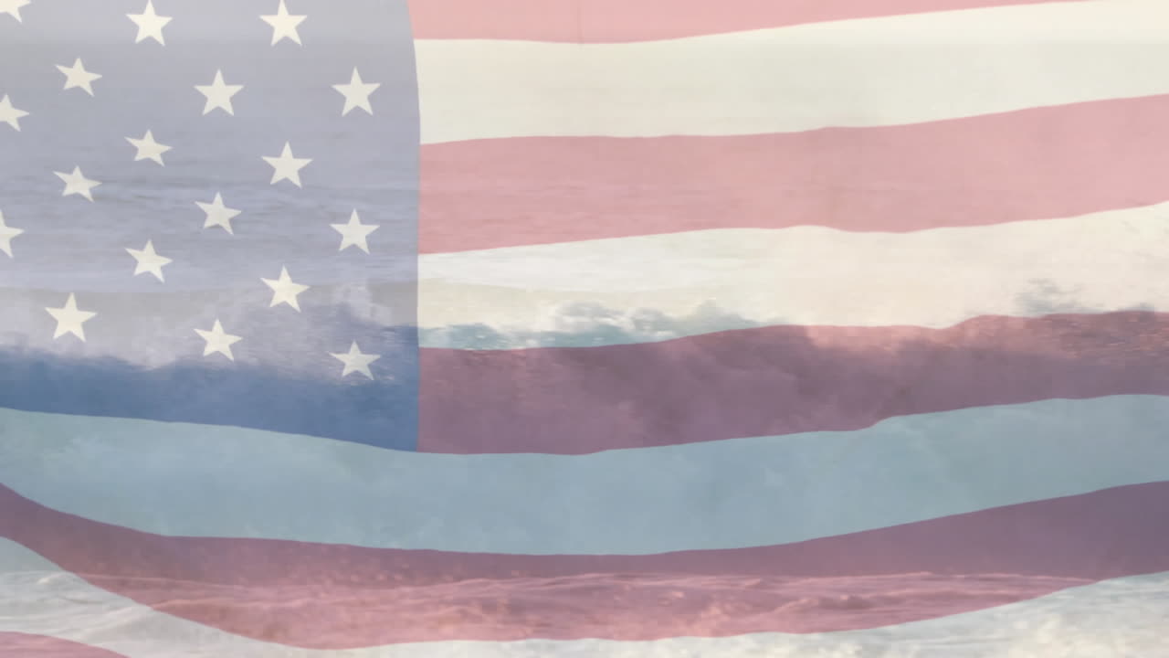 Composição digital de bandeira dos EUA tremulando contra ondas no mar