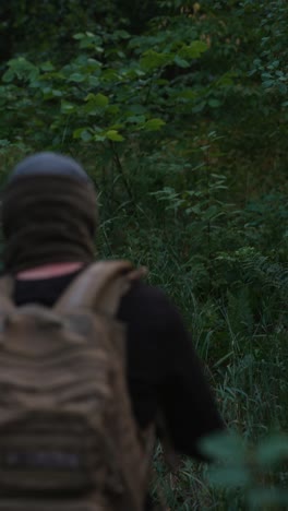 person hiking in forest