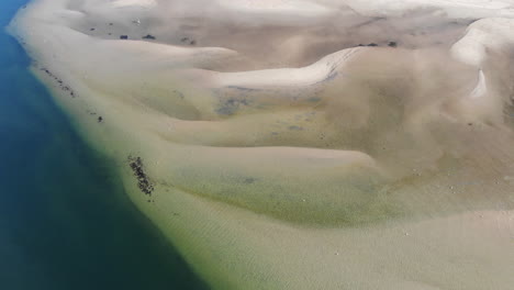 Aerial-flight-over-the-coastline-of-St-Kilda,-Melbourne