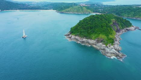 Drone-footage-aerial-top-view-of-catamaran-sailing-in-the-open-sea