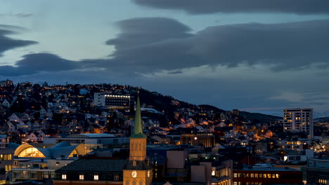 twilight time lapse of tromso city settling in for the night, norway