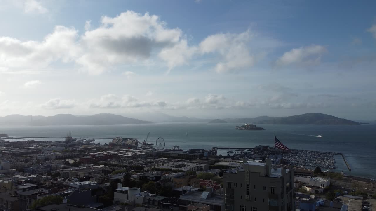 Expensive Real Estate (Residential Neighborhood) In The Scenic Waterfront, Harbor, And Marina Of San Francisco Bay, California, USA. Slow Aerial Approach Towards Alcatraz Island.