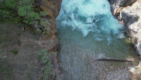 beautiful aqua blue waterfall in montana [4k
