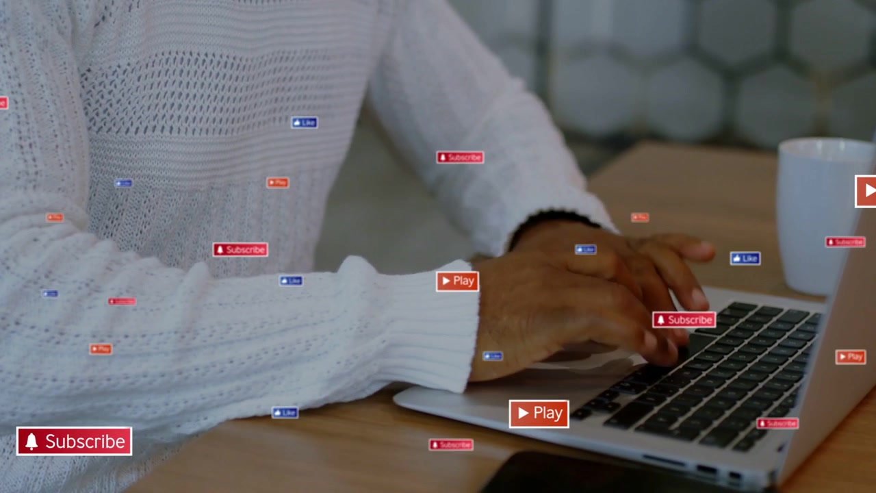 Senior man sipping while typing on laptop, alerts appearing and driving phone taps for social media
