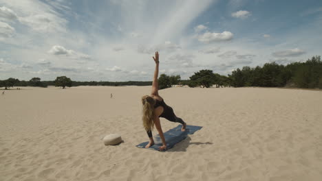 woman practicing yoga exercises and doing warrior poses